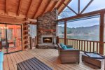 Stay warm by the wood fireplace overlooking Lake Buckhorn 